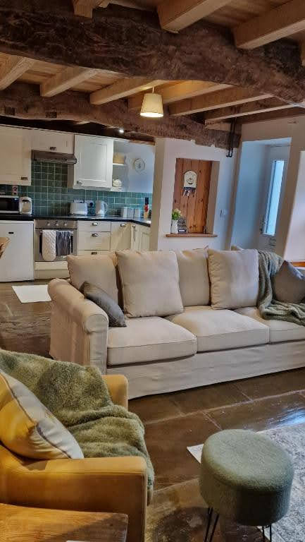 Living room with beamed ceiling